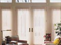 Vertical blinds installed in living room doors